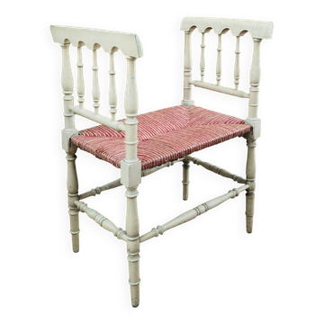 Banquette from the late 19th century with a seat in coloured straw and a re-painted structure.