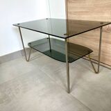 1975 glass coffee table with 2 tops, good condition