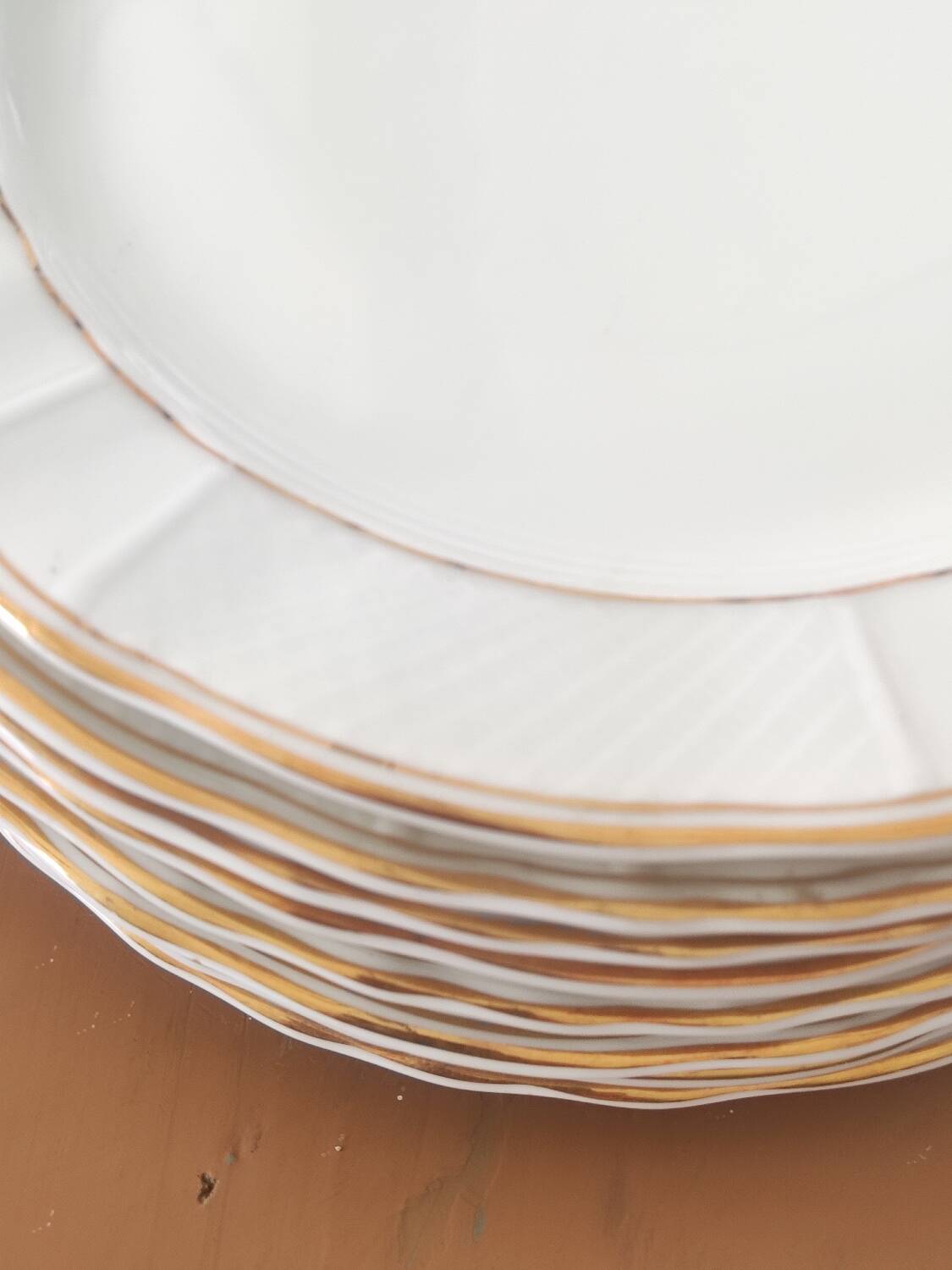 Ten Limoges porcelain plates B et Cie