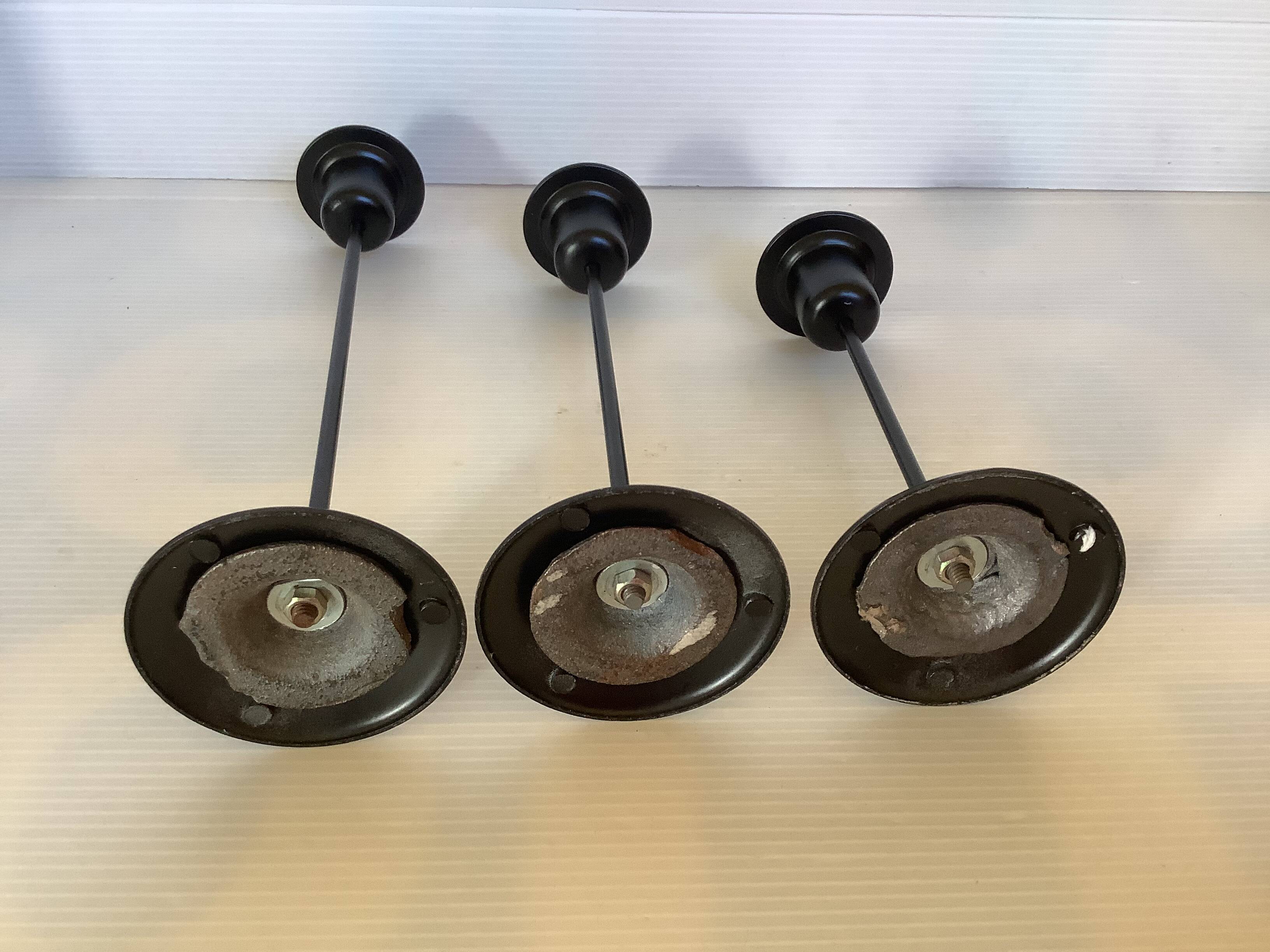 Trio of Scandinavian candlesticks with black tulip base
