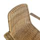 Vintage wicker chair with black steel frame and armrests
