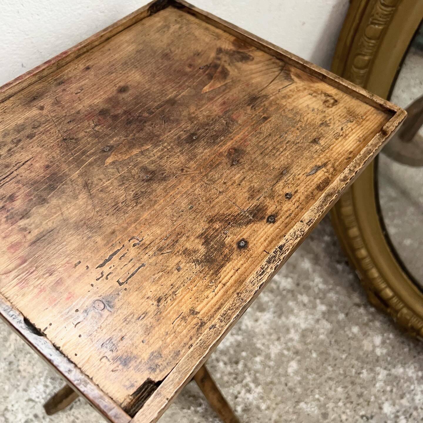 Old primitive wooden tripod pedestal table