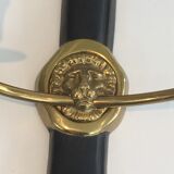 Pair of Black Lacquered Bronze Wall Lamps with Lions' Head Decorations. Around 1970
