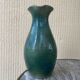 Vintage blue-green enamelled earthenware carafe