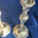 Paire bougeoirs style Louis XVI  en métal argenté