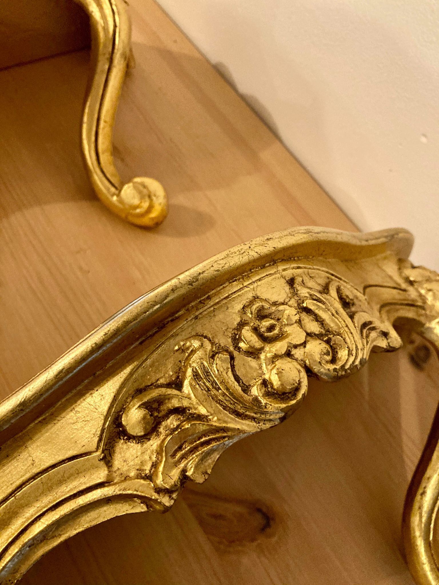 Pair of gilded wall shelves