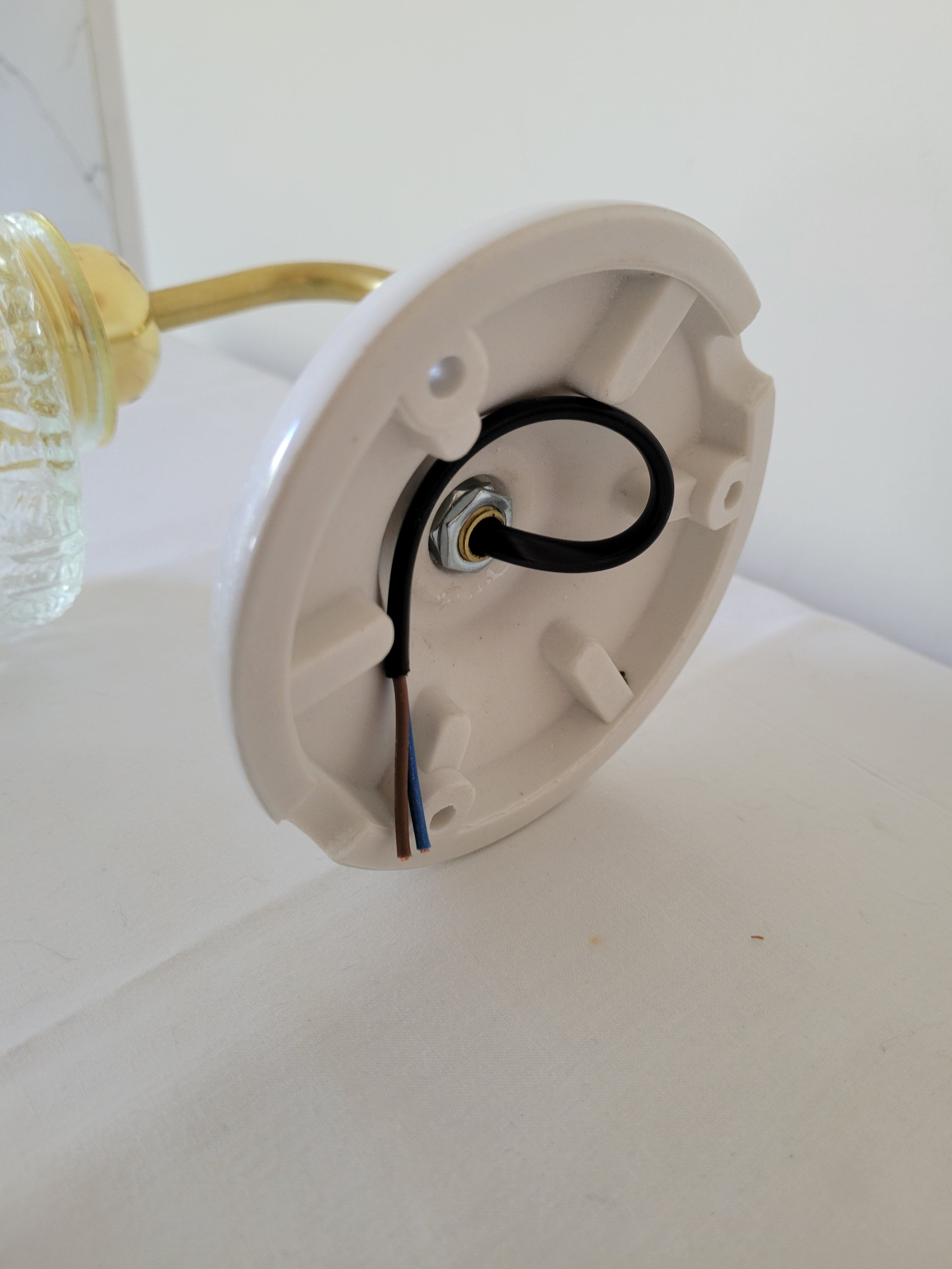 Porcelain, brass and glass wall lamp