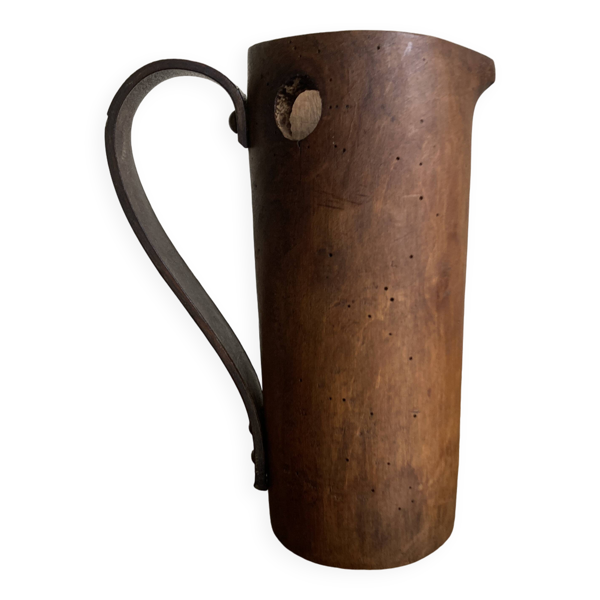 Mountain pitcher in monoxile wood and leather folk art