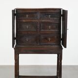 Unique antique English cabinet on stand made of oak from the 17th century