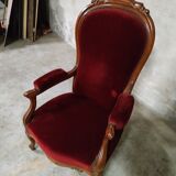 Walnut and velvet armchair