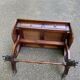 Victorian English extendable coffee table made of solid mahogany and leather.