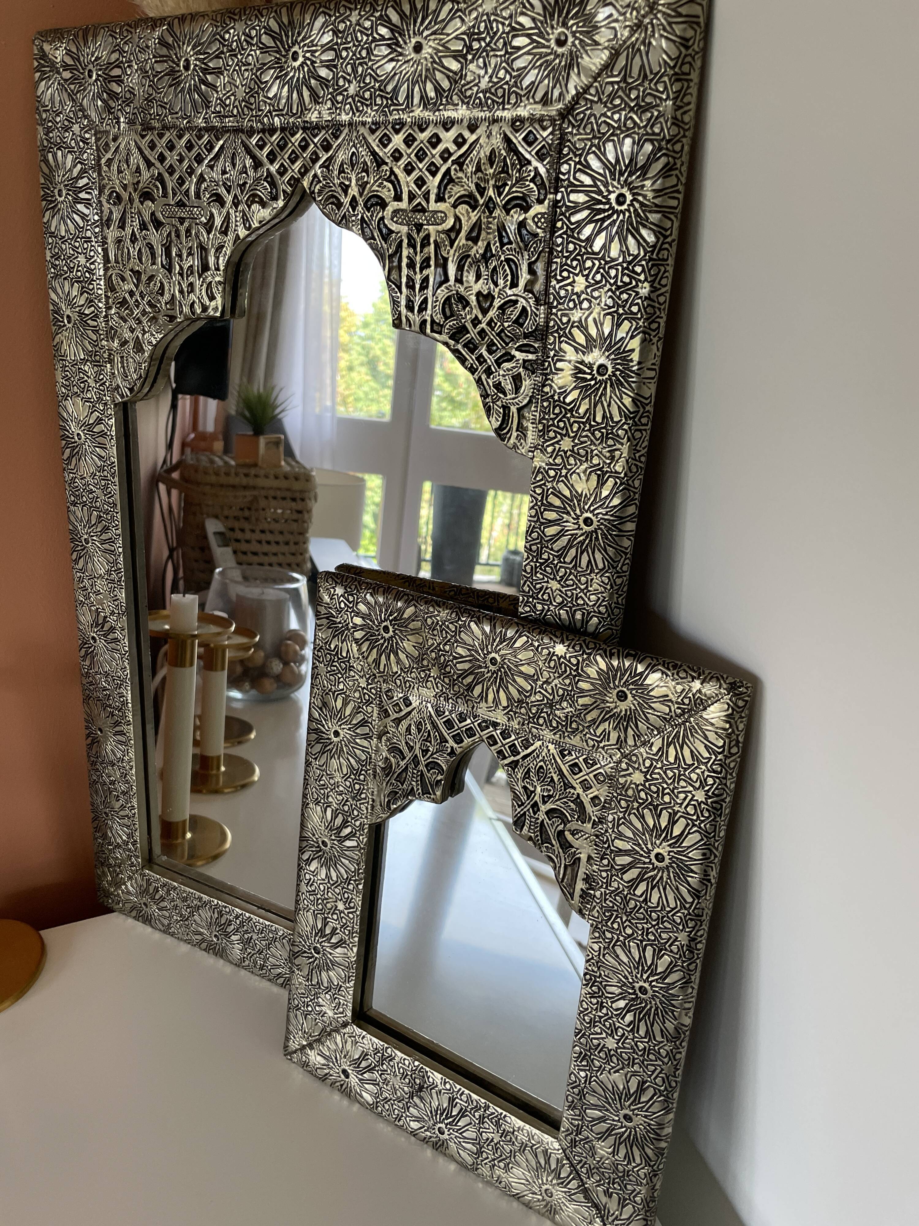 Silver oriental mirror