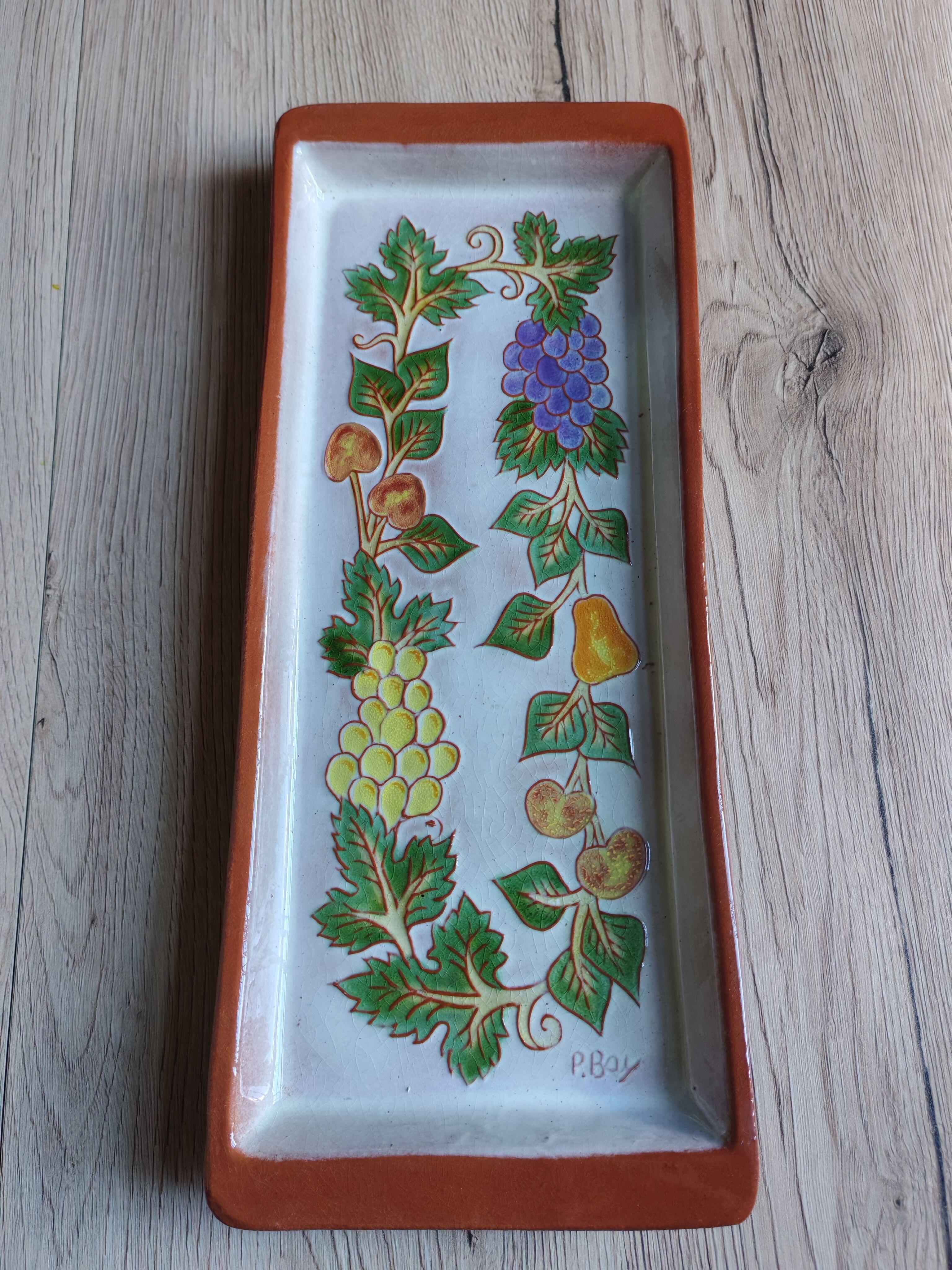 Terracotta plate signed P.Boy, glazed artisanal ceramics.
