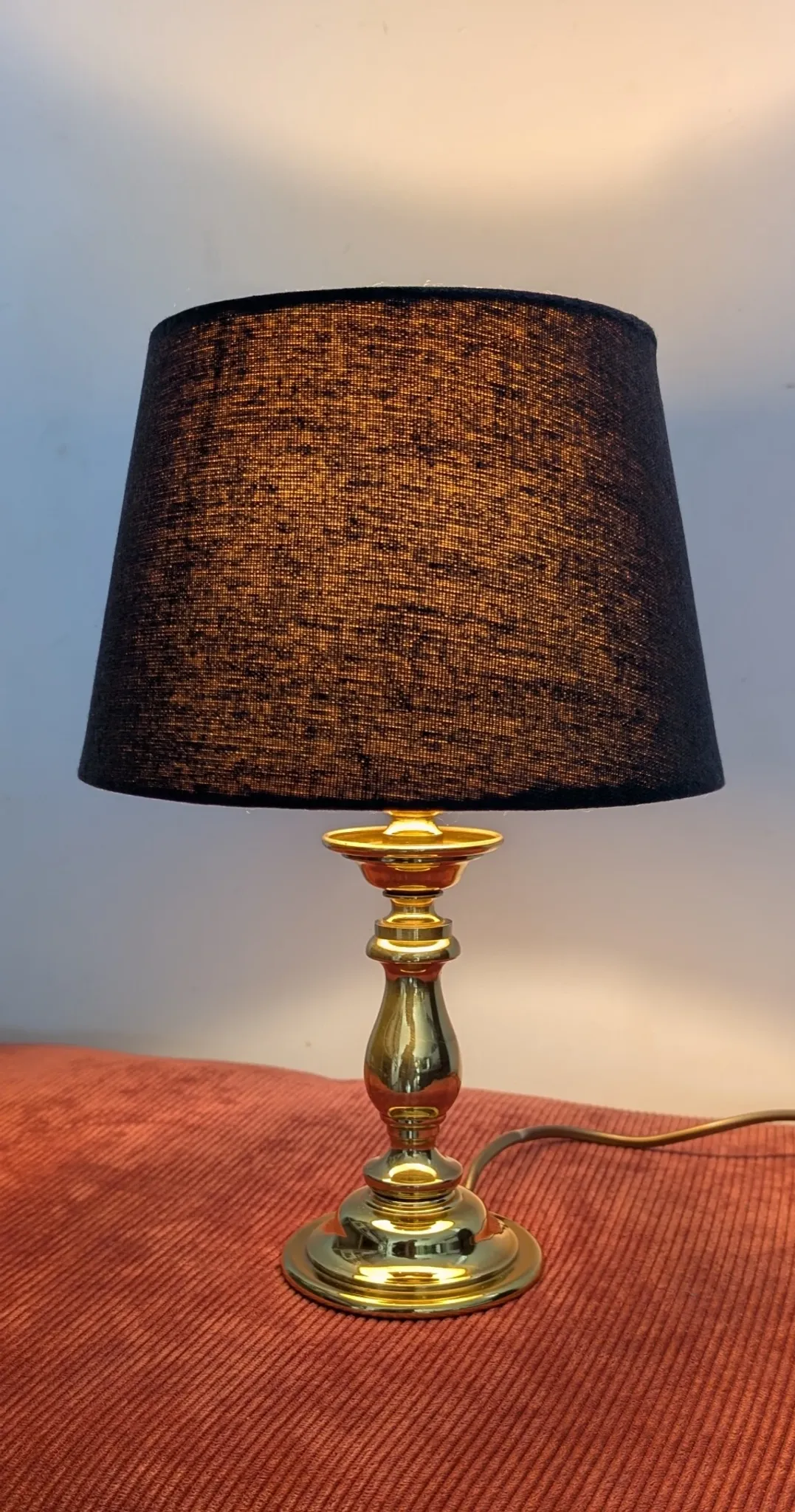 Brass lamp with black fabric shade