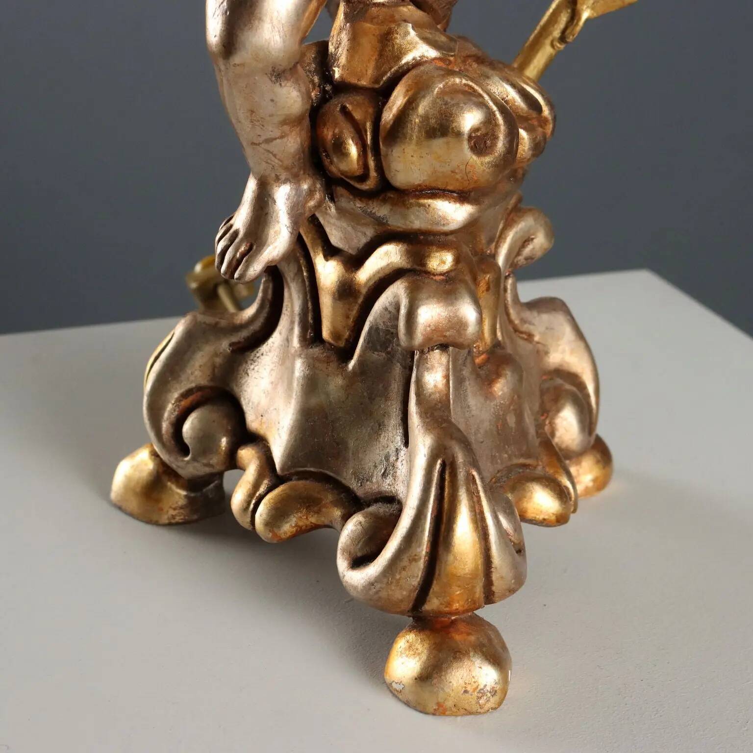 Pair of antique candelabra in carved and gilded wood, Italy, 20th century