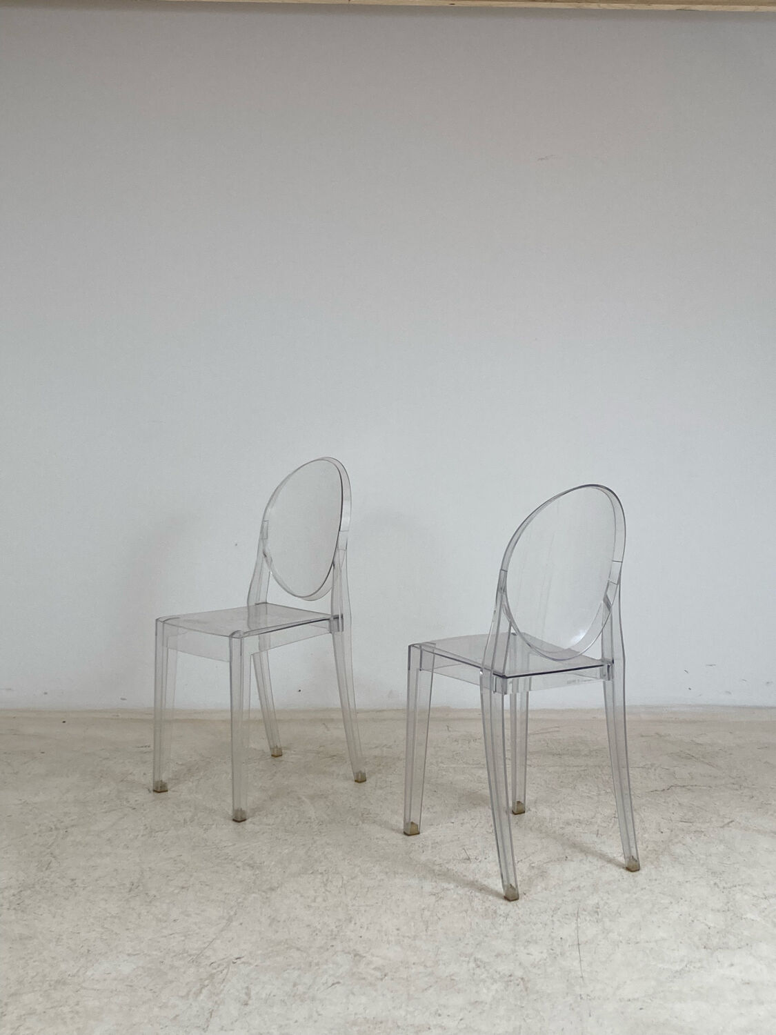 Pair of Victoria Ghost chairs by Philippe Starck Kartell edition
