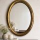 Antique oval gold mirror in Louis XVI style - beautiful patina.