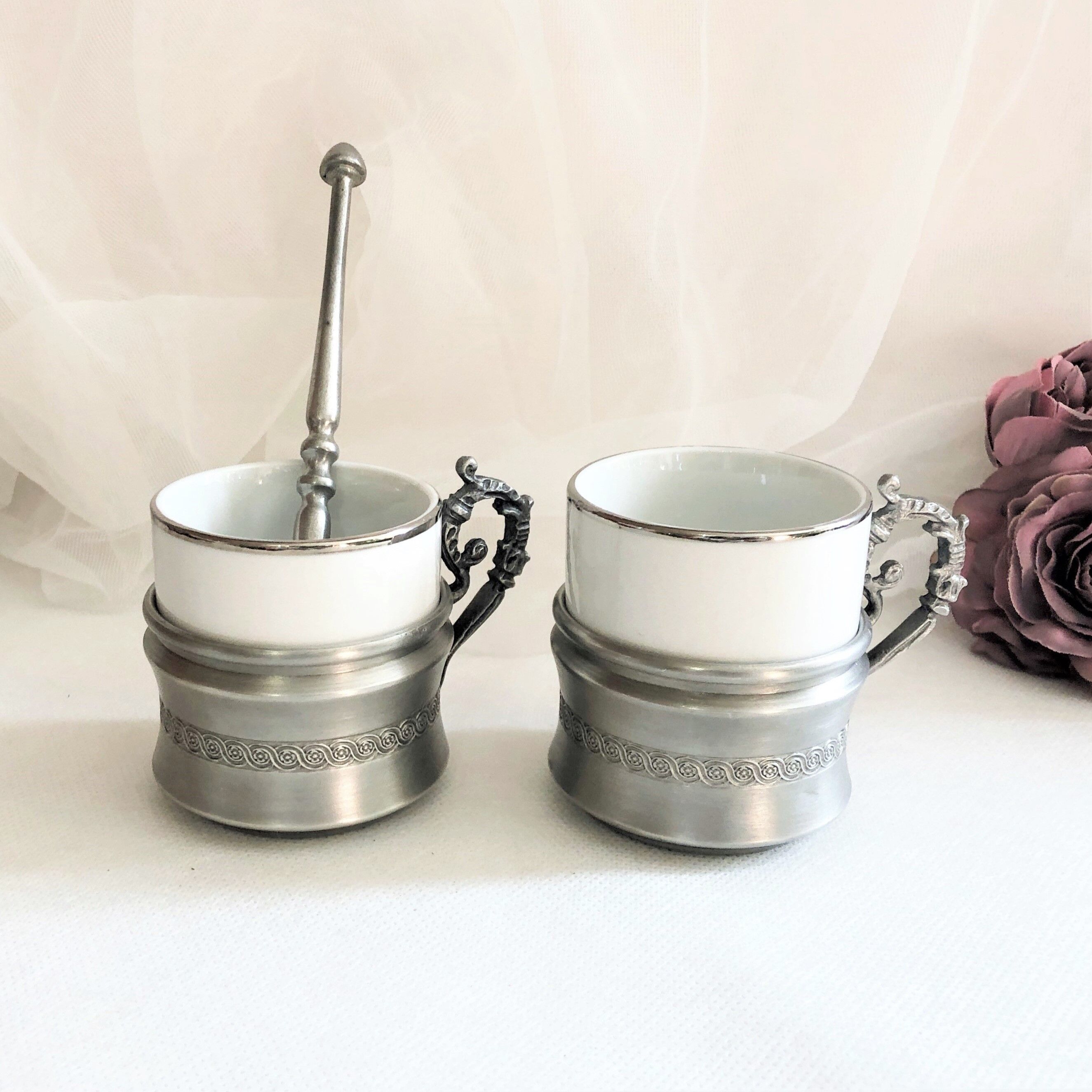Set two porcelain cups with pewter support