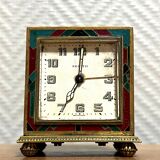 Zenith travel alarm clock with enamelled bronze case with Art Deco pattern