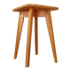 Wooden stool with tapered legs