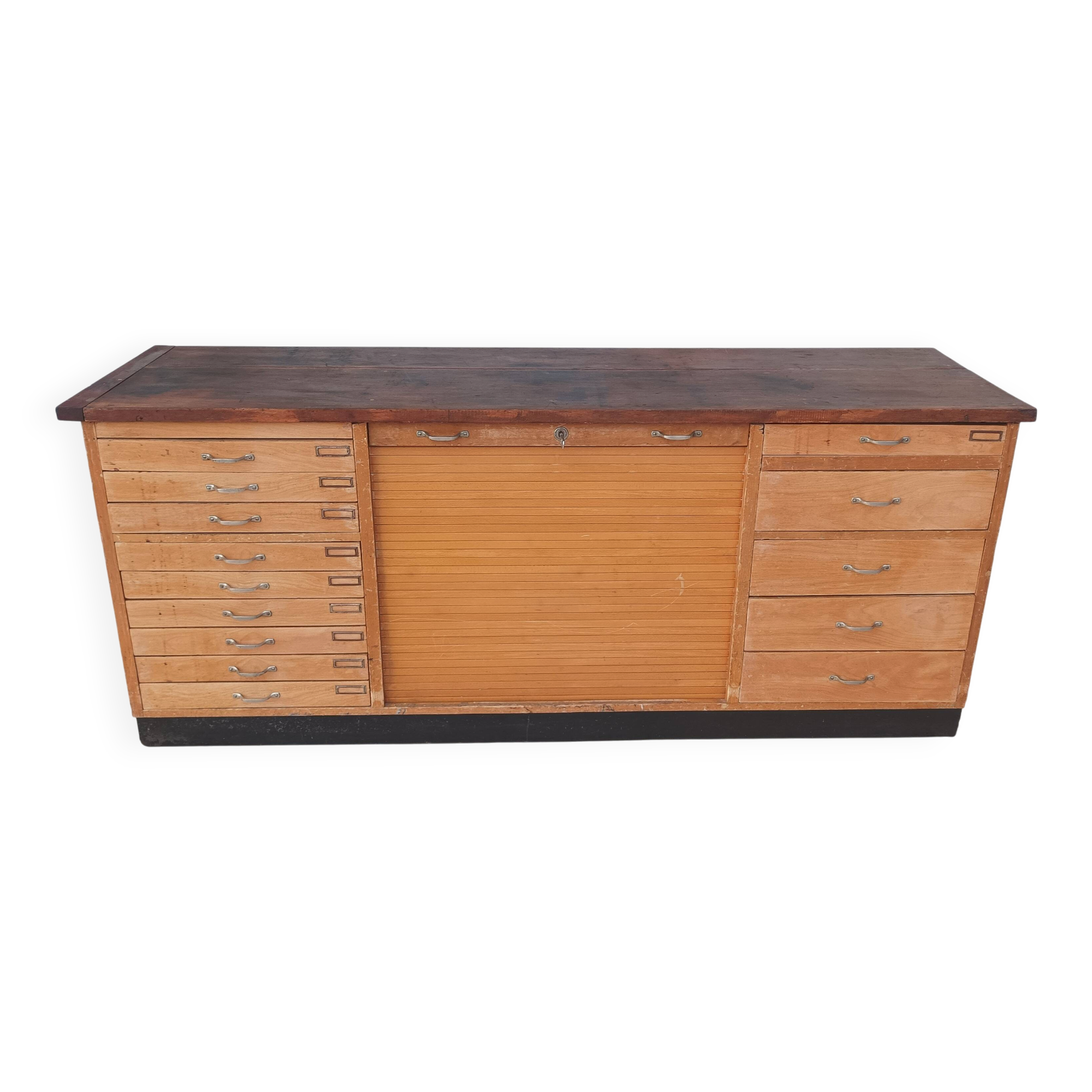 Workshop furniture with drawers and curtain in beech and walnut.