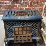 Cast iron and blue ceramic wood stove, from the Chauffette brand