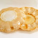 Pair of iridescent orange glass egg plates