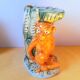 Monkey slipware jug
