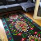 Romanian floral runner rug on blue background