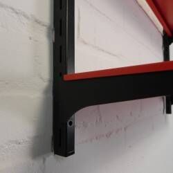 Tomado Holland - A. Dekker wall shelf, orange and black, 1970s