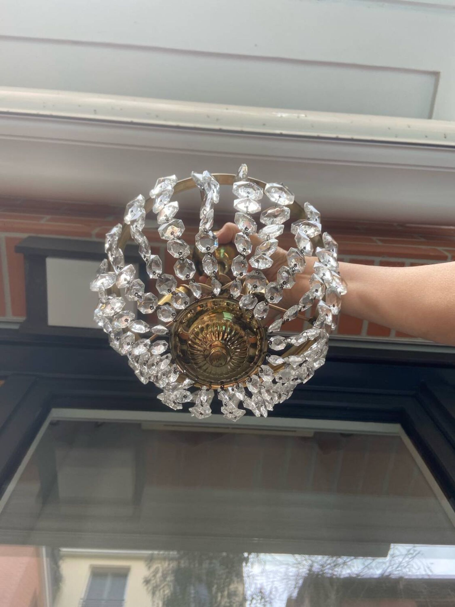 Crystal and brass chandelier pendants