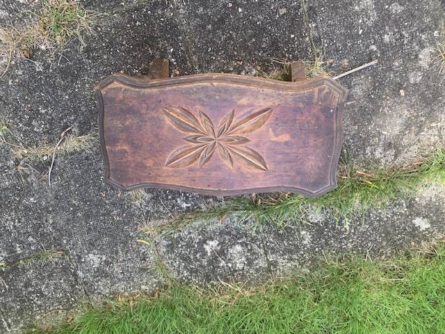 Bench in carved and varnished wood, mountain chalet decoration, old