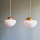 Duo of Art Deco suspensions in white opaline, 1920s-30s