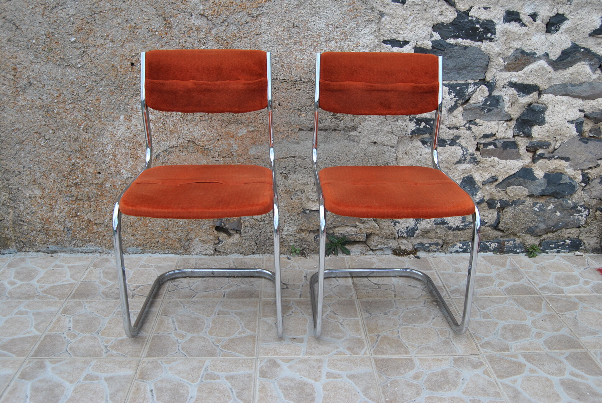 Pair of orange velvet chairs Roche Bobois 70s