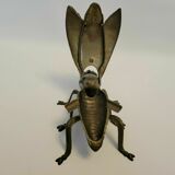 Old brass ashtray in the shape of a fly