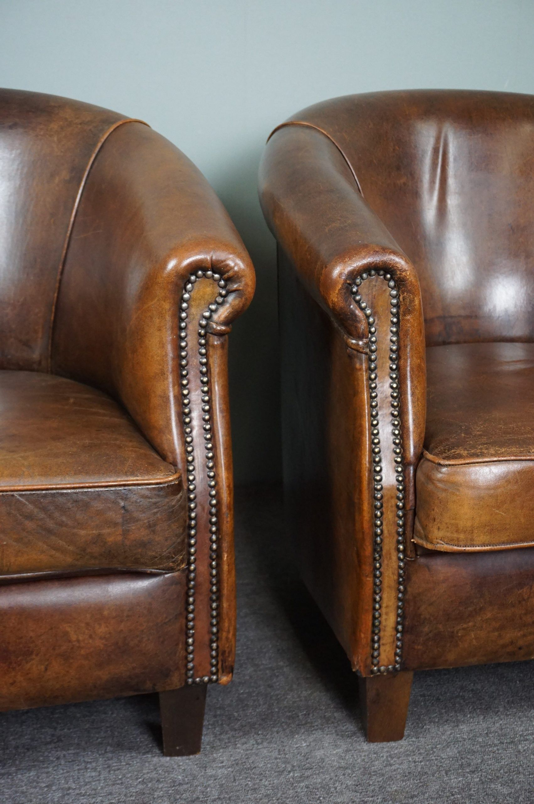 Set of 2 club armchairs in sheep leather