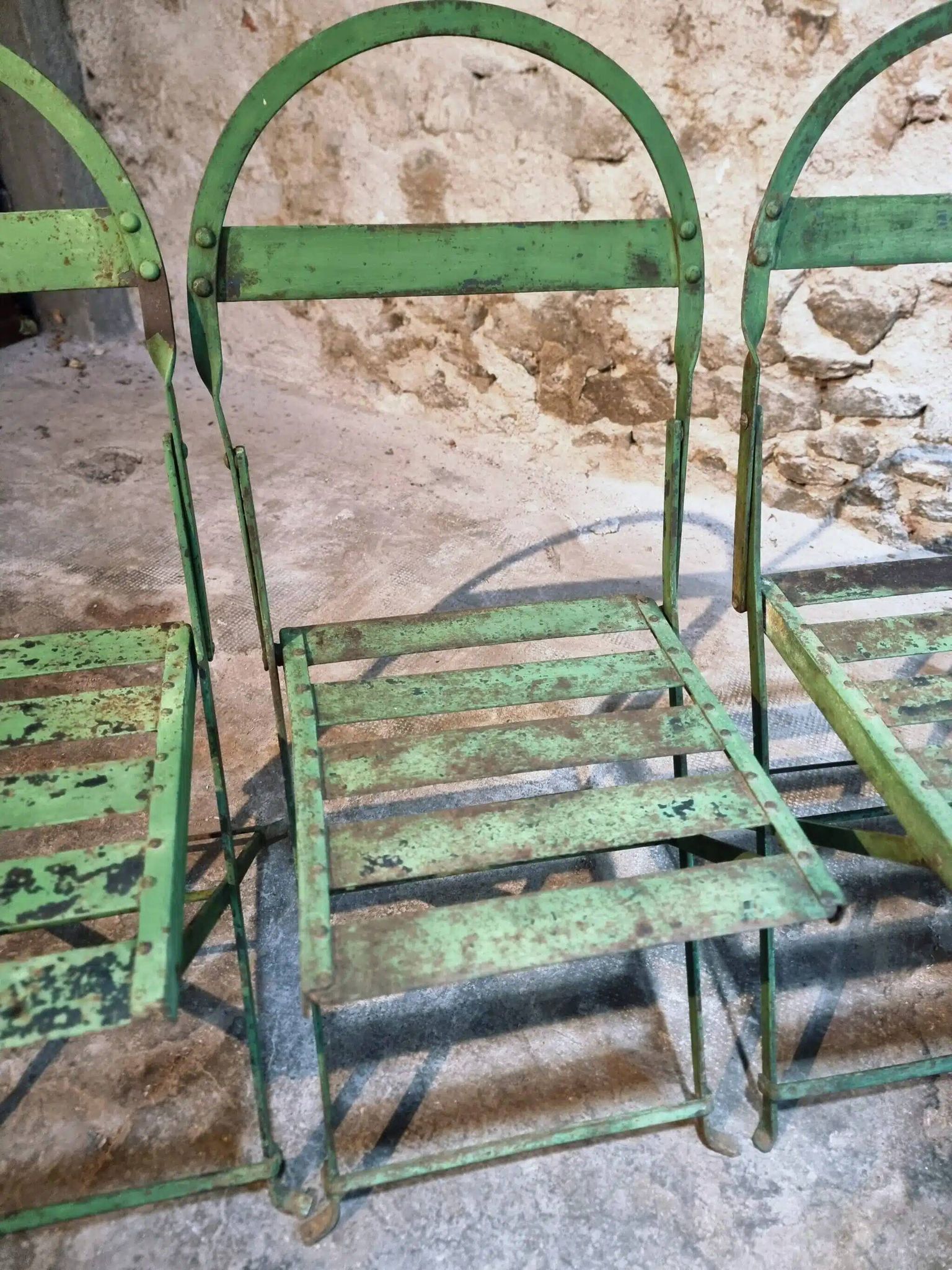 Set of 4 Antique Iron Folding Garden Chairs - 1920s Riveted Bistro Chairs with Aged Green Patina