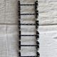 6 vintage black metal knife rests with scrollwork decoration