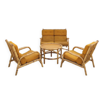 Living room sofa, 2 armchairs and a vintage rattan coffee table from the 1950s.