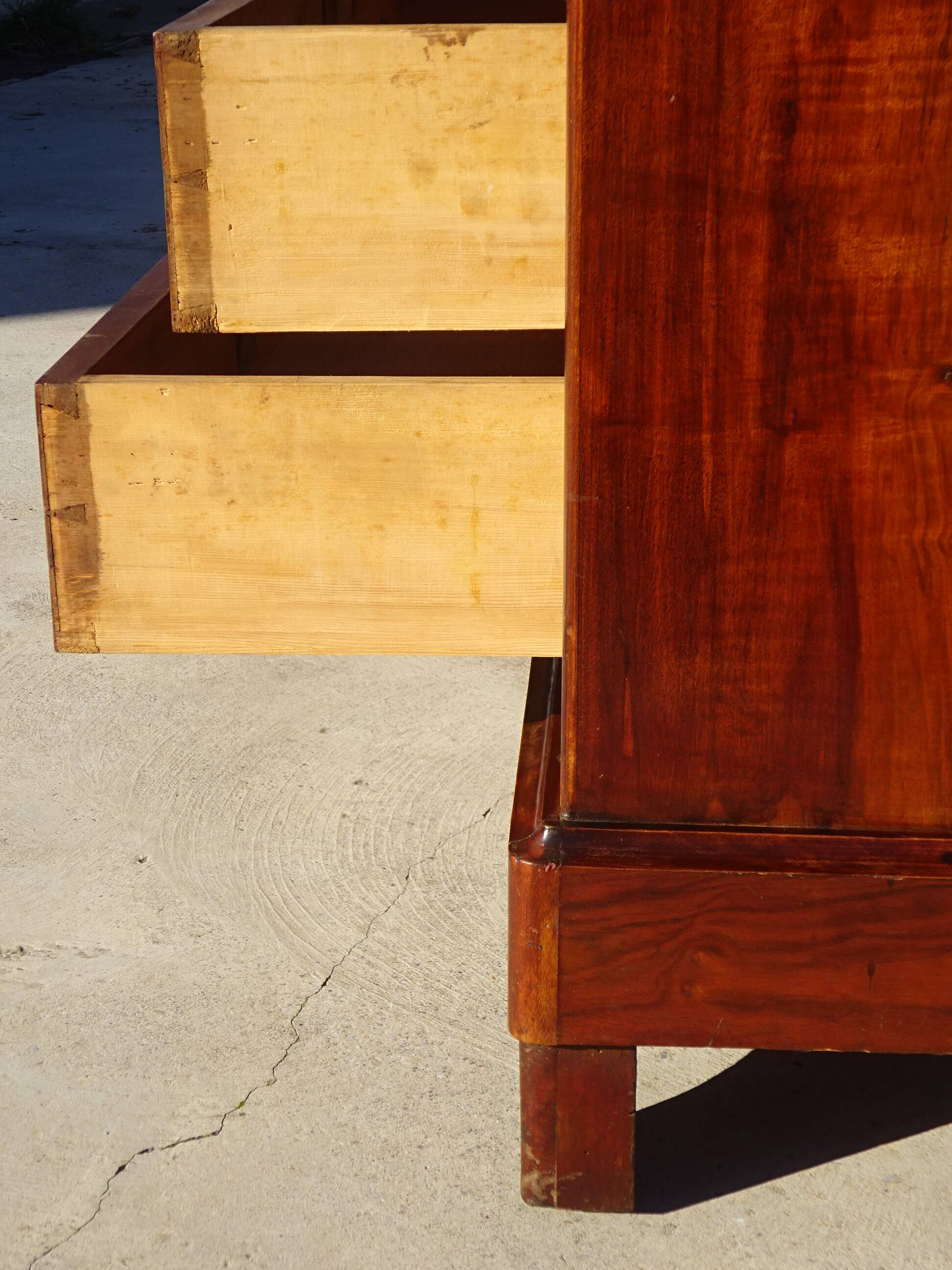 Antique mahogany chest of drawers with white marble.