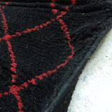 Vintage ancestral black Berber rug in wool