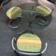 Table ronde en verre avec 3 chaises vintages