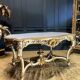 Table de milieu d’époque Napoléon III en bois peint et doré