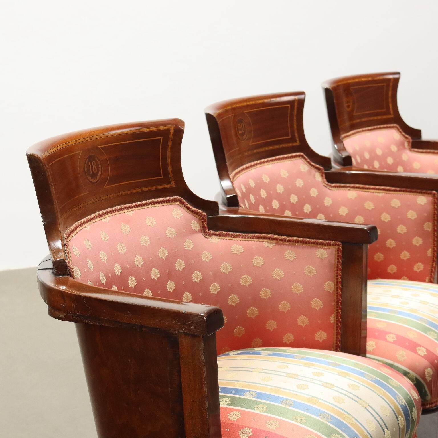 Three vintage cinema or theatre armchairs
