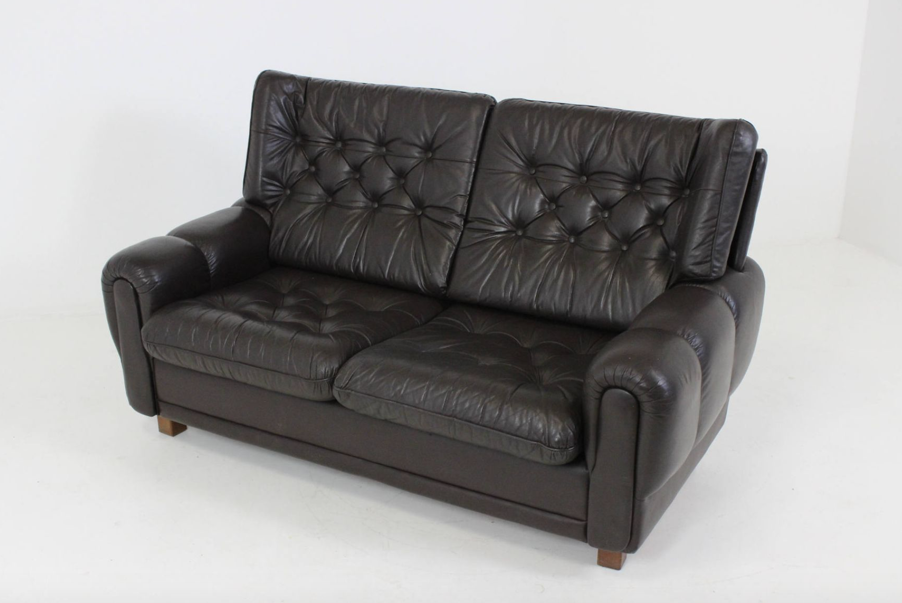Mid-century black leather sofa