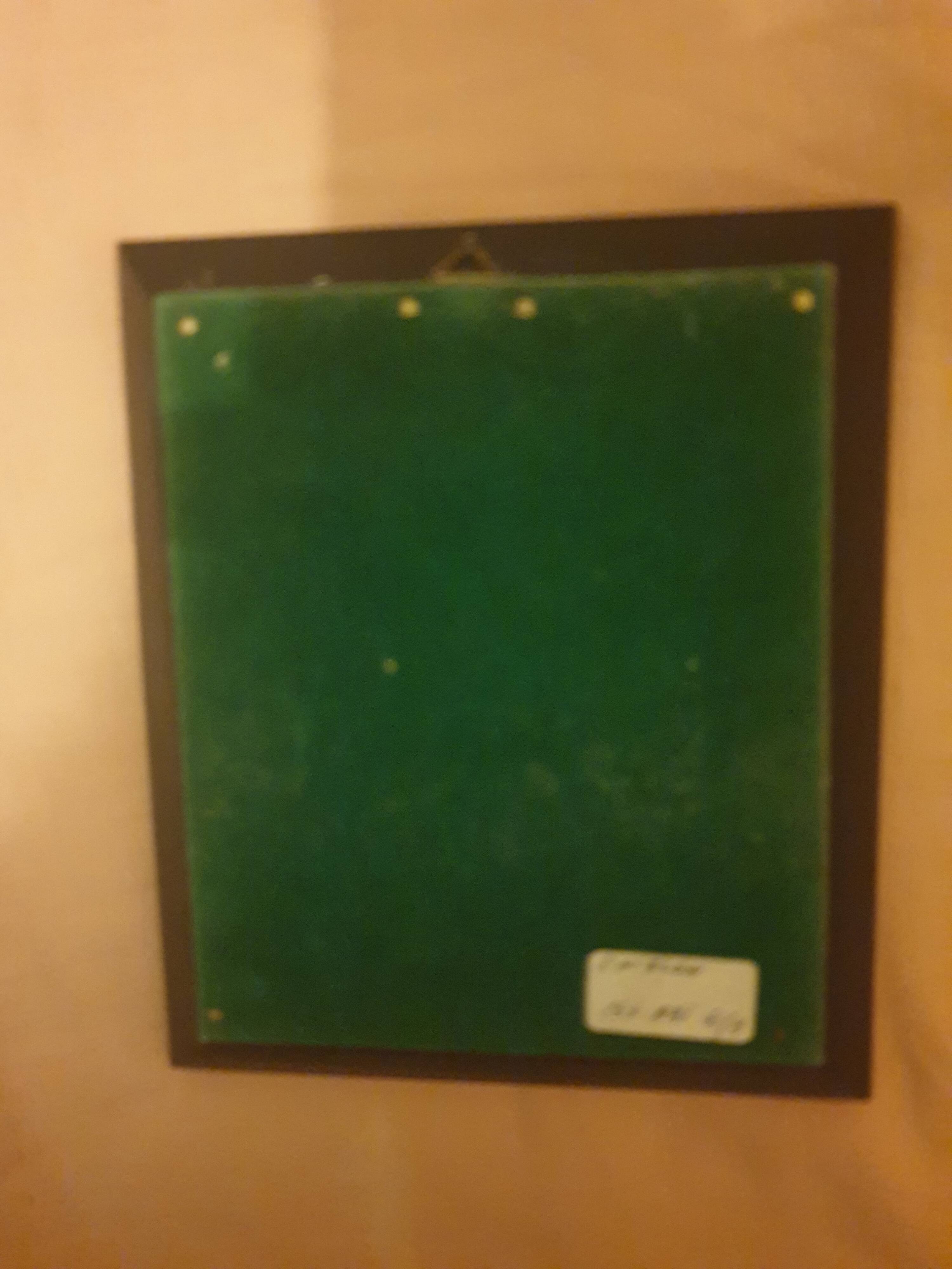 Miniature portrait of a man in a wooden frame