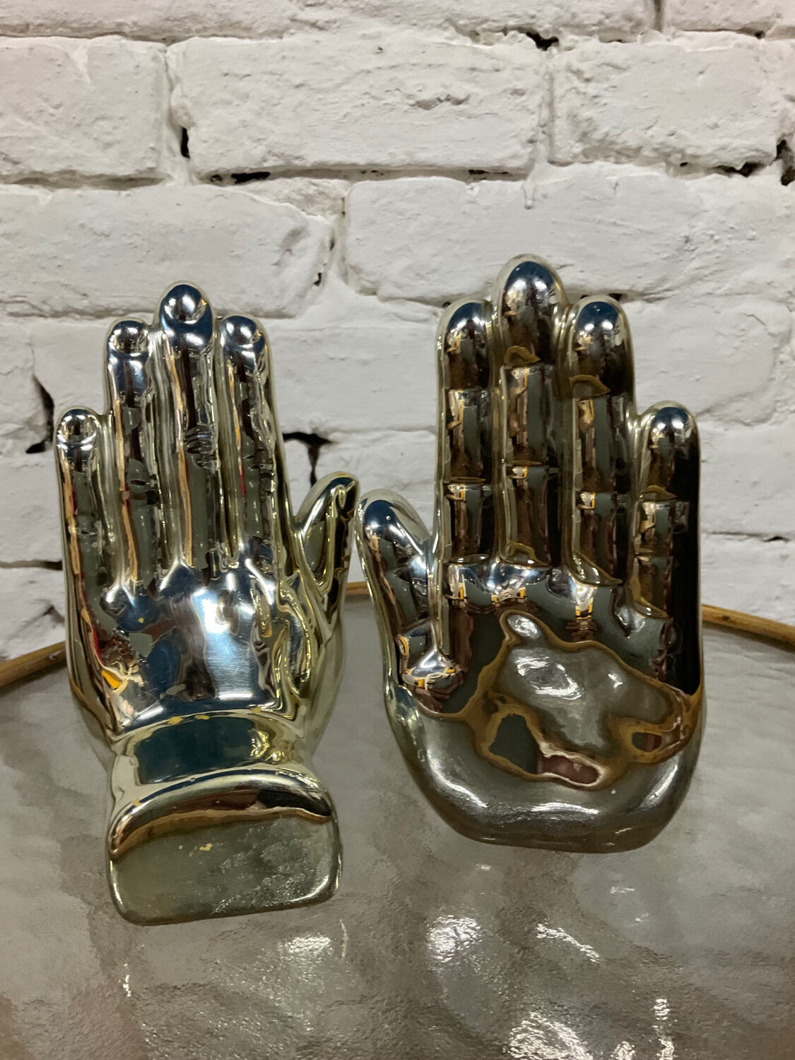Pair of chrome ceramic hand bookends from the 70s and 80s