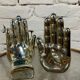 Pair of chrome ceramic hand bookends from the 70s and 80s