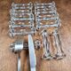 Set of 12 antique knife and fork rests in thick transparent glass.