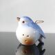 Vintage bird salt cellar in blue and white porcelain.